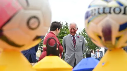 PA Media Prince Charles talks to trust supporters in Cardiff