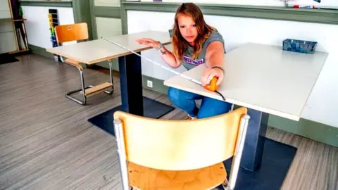 Getty Images teacher measuring distance