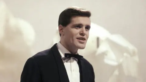 Getty Images Ronnie Carroll represented the UK in the Eurovision Song Contest two years in a row