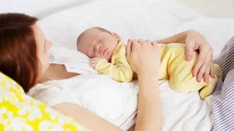 Getty Images Mother and baby