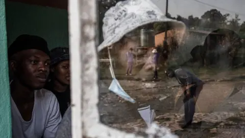Marco Longari/AFP Lesotho Independent Electoral Commission officials