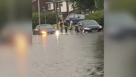 ThOMAS CANDLISH Eccles in Salford was hit by flash flooding