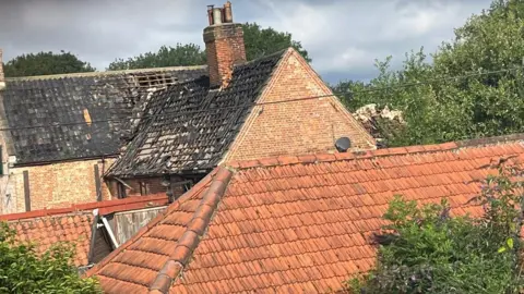 Thomas Dack Hotel roof after fire