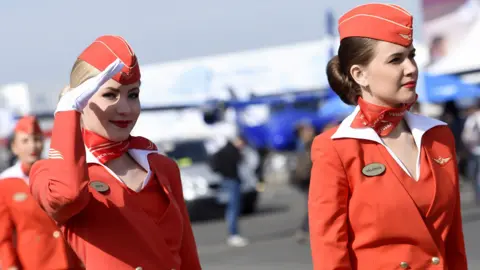 Aeroflot flight attendants win compensation over uniform size 