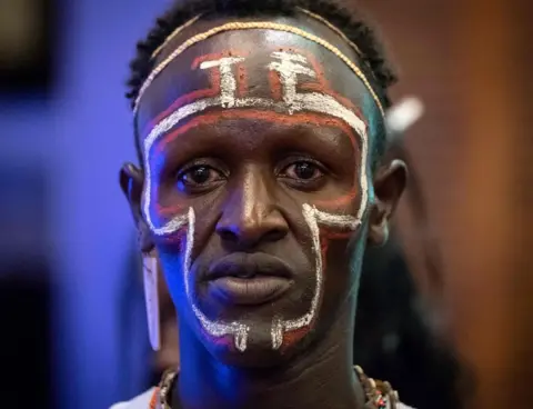 AFP A dancer of El-molo tribe performs during the launching ceremony of the 11th Marsabit-Lake Turkana Cultural Festival in Nairobi, Kenya, on June 20, 2018. The annual festival will take place between June 28 and 30, 2018, featuring the cultural traditions of 14 ethnic tribes in Marsabit county, the nothern part of Kenya, to promote tourism and their social inclusiveness