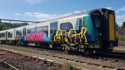 West Midlands Trains London Northwestern Railway carriage with graffiti