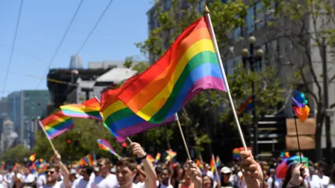 Arun Nevader/Getty Images Marchers wave Gay Pride flag during the 2018 San Francisco Pride Parade on June 24, 2018 in San Francisco, California