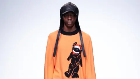 Peter Cryer Liam's knitwear often features funny motifs, like this laughing bear