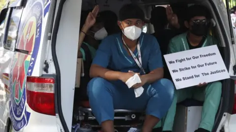 EPA Ambulance volunteers protest in Yangon