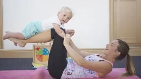 Laura Cullen Laura Cullen with toddler in studio