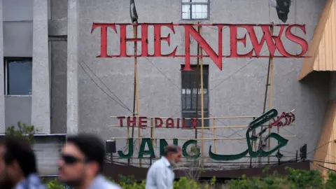 AAMIR QURESHI/AFP This picture taken on June 28, 2018, shows the facade of the leading daily Pakistan's newspapers "The News" in English and "Jang" in Urdu languages in the garrison city of Rawalpindi.