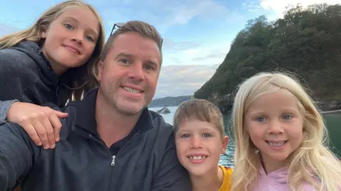 Marcus Elwell Marcus and children