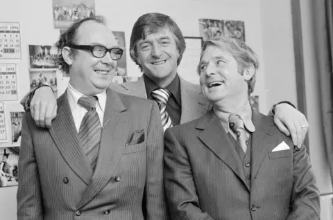 Radio Times Michael Parkinson with Morecambe and Wise in 1976