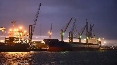 Getty Images Ships are moored in the harbour at sunset in Hartlepool