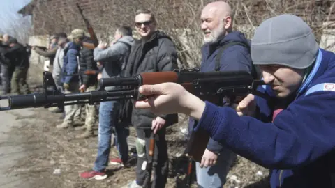 EPA Ukrainian volunteer soldiers are trained to use weapons in Odesa