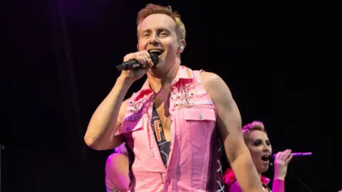 Getty Images Ian 'H' Watkins from Steps claimed to be "bowled over" by the idea of a statue of him