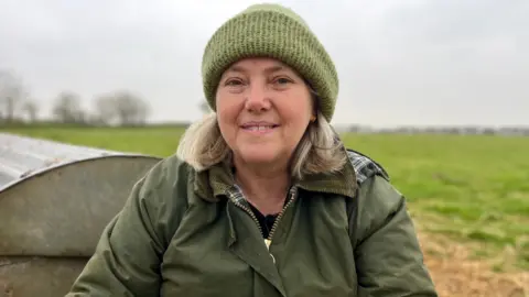 Martin GIles/BBC Teresa Cook in a field