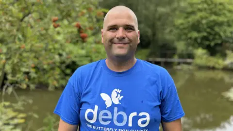 Shaun Whitmore/BBC Charlie-Mai's dad Kelvin