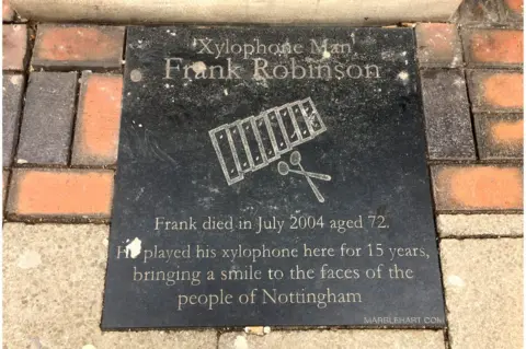 Historic England Xylophone man plaque