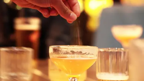 Getty Images A drink being spiked