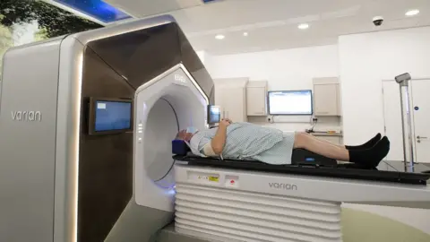 PA Media Patient going into AI scanner