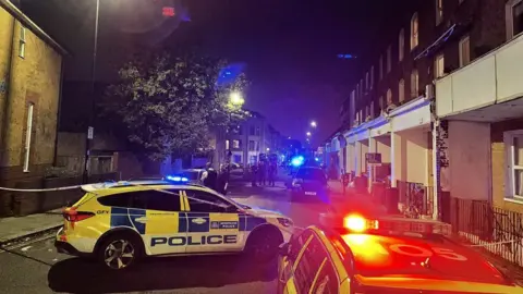 Brixton shooting: Two men dead as police start hunt for gunman