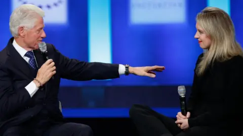 Getty Images Bill Clinton and Elizabeth Holmes