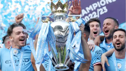 Manchester City celebrate winning the Premier League