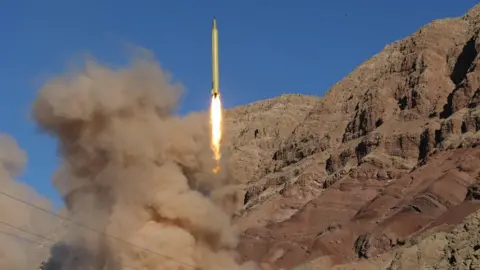 AFP A long-range Qadr ballistic missile is launched in the Alborz mountain range in northern Iran on 9 March 2016