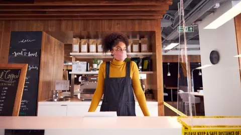 Getty Images Coffee shop worker