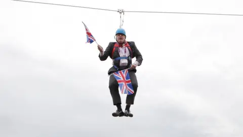 Getty Images Boris Johnson got stuck on a zip-line on August 01, 2012