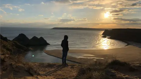 Derek Davies Sunset at Three Cliffs Bay