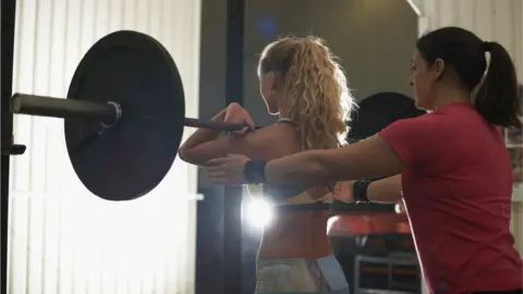 Getty Images A woman getting personal training