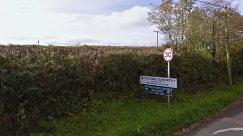 Google Woolfardisworthy road sign