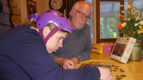 Amy doing a jigsaw