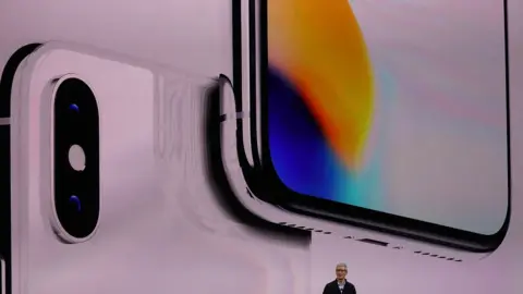 Getty Images Apple CEO Tim Cook speaks during an Apple special event in the US on 12 September 2017