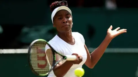 Press Association This file photo of Venus Williams shows the tennis athlete hitting a tennis ball