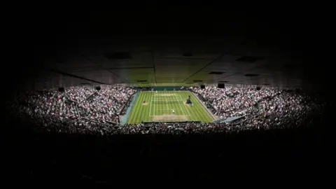 Mike Hewitt/Getty Images Spectators watch play between Australia's Ashleigh Barty and Czech Republic's Karolina Pliskova during the women's singles final