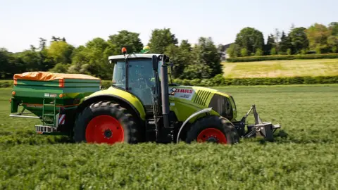 Getty Images A tractor in a field