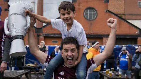 Leicester City FC/Getty Images Leicester fans celebrate their teams victory after the FA Cup Final