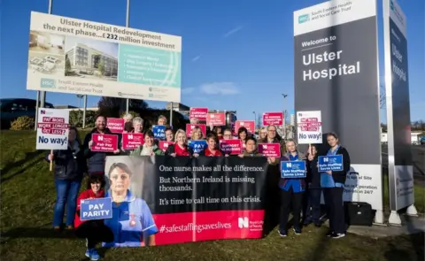 PA Media Members of the RCN outside the Ulster Hospital