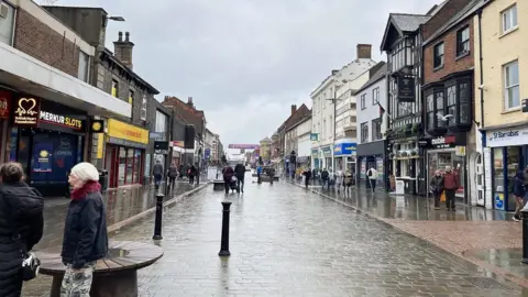 LDRS The strip between the railway barriers and St Mark's shopping area