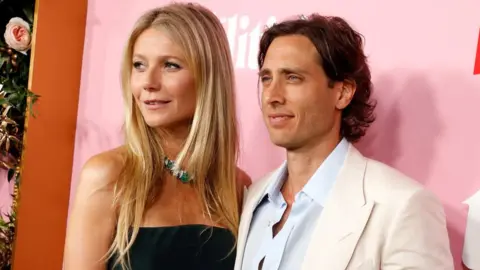 Getty Images Ms Paltrow and husband Brad Falchuk in 2019