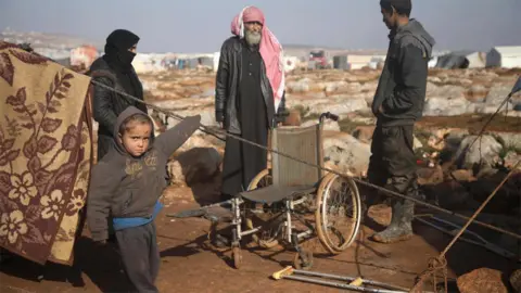 AFP Displaced Syrians at a camp in Kafr Lusin, Idlib province (29 January 2019)