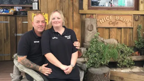 Laura Baker Couple in front of cafe