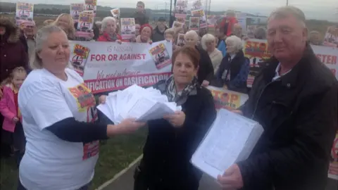 Stuart Wall Campaigners holding petition against waste energy plant in Washington