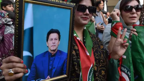 EPA Supporters of jailed former Prime Minister Imran Khan shout slogans during an election campaign and for the release of Khan from prison, in Karachi, Pakistan, 28 January 2024