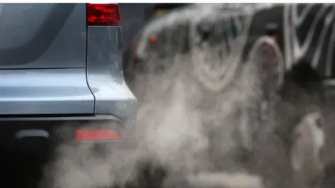 Getty Images Emissions from a car