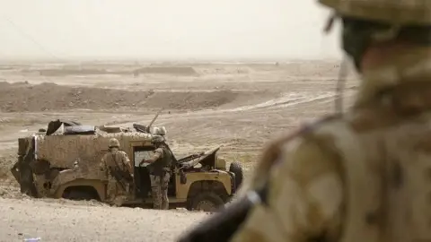 AFP/Getty Land Rover in Iraq