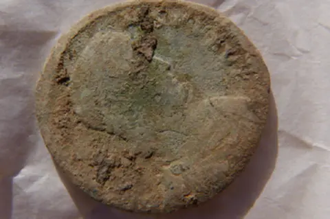 Swandro-Orkney Coastal Archaeology Trust Roman coin found on Orkney